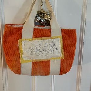 This is a very unique, hand sewn Wizard of Oz tote.